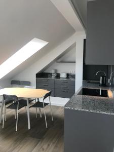 Kuchyň nebo kuchyňský kout v ubytování Sissi Apartments