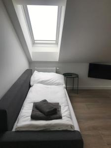 Postel nebo postele na pokoji v ubytování Sissi Apartments