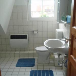 Ένα μπάνιο στο Ferienwohnung-Kapitaens-Kajuete