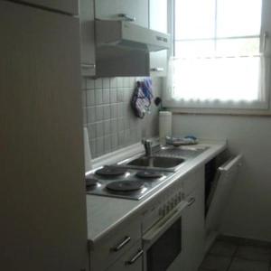 Virtuvė arba virtuvėlė apgyvendinimo įstaigoje Ferienwohnung-Kapitaens-Kajuete