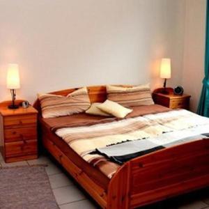 A bed or beds in a room at Ferienwohnung-Wiesengrund