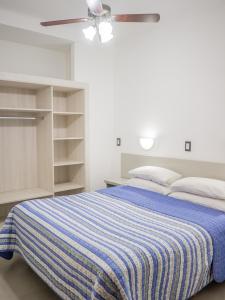 Postel nebo postele na pokoji v ubytování Belián Hotel