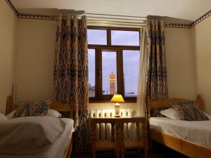 Old Bukhara Boutique客房内的一张或多张床位
