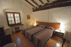 Postel nebo postele na pokoji v ubytování Mas D'en Gregori + 35 fotografií