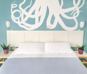 Postel nebo postele na pokoji v ubytování Hotel Aloha + 37 fotografií