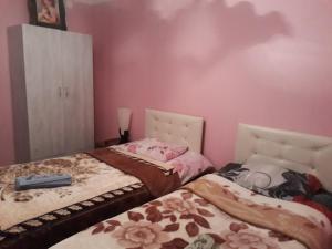 Letto o letti in una camera di Guest House Karati