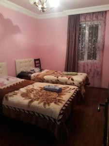 Letto o letti in una camera di Guest House Karati