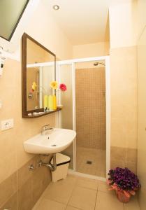 Kúpeľňa v ubytovaní Hotel Alibi