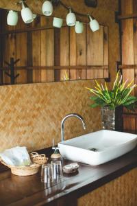 a white sink on a counter in a bathroom at Bayview Hill Resort in Ko Lipe