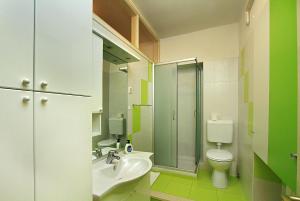 Koupelna v ubytování Apartments Barbaresko + 37 fotografií