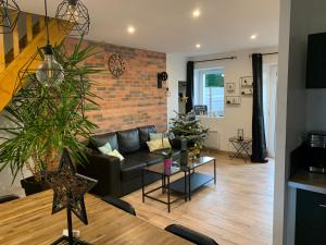 Posezení v ubytování Gite 5 pers avec 2h espace bien-être privatisé inclus dans le prix de la nuit 80m2 de détente