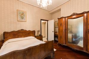 Postel nebo postele na pokoji v ubytování Hotel Letizia