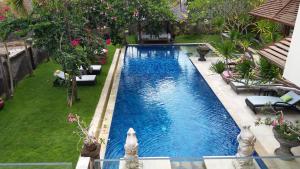 an overhead view of a swimming pool in a backyard at Unique spacious luxury villa in Jimbaran