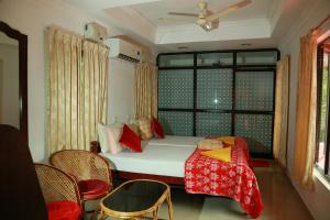 Кровать или кровати в номере Marari Nest Beach Homestay