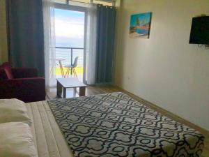 Postel nebo postele na pokoji v ubytování Acapulco Resort