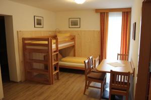 Łóżko lub łóżka w pokoju w obiekcie Hotel Garni Dorfblick