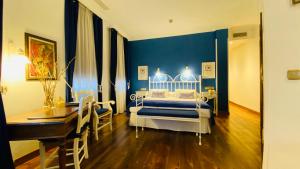 Postel nebo postele na pokoji v ubytování Hostal Paris