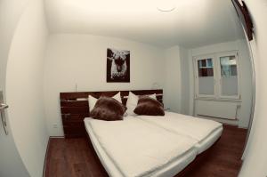 Postel nebo postele na pokoji v ubytování Emelie Zermatt 4****