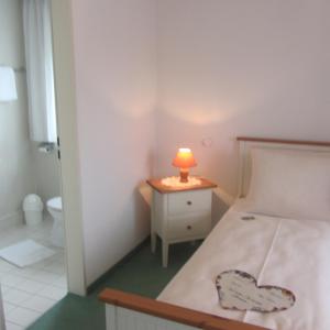 Krevet ili kreveti u jedinici u okviru objekta Hotel Angermeier GARNI