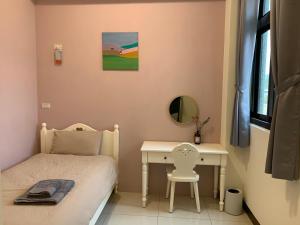 TV a/nebo společenská místnost v ubytování White Cat B&B