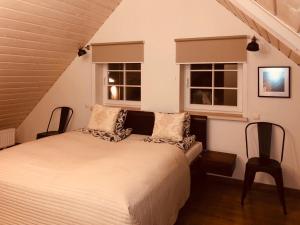 Postel nebo postele na pokoji v ubytování Hotel Vilhelmine