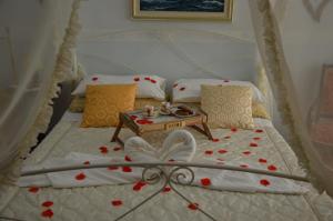 Un pat sau paturi într-o cameră la A Casa di Mich
