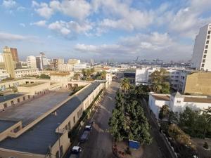 een luchtzicht op een stad met gebouwen bij Blume Apartment Casa Port - 2 Bedrooms in Casablanca