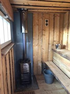 Et opholdsområde på Sunrise Cabin et Sauna