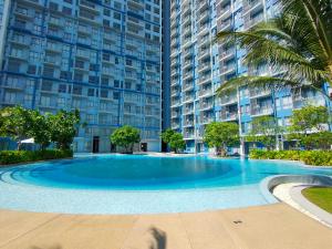 Bazén v ubytování BLU-Pool Access nebo v jeho okolí