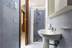Kúpeľňa v ubytovaní Appartamento Orizzonte by BarbarHouse + 19 fotografií