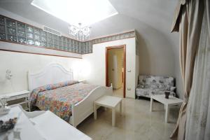 Posteľ alebo postele v izbe v ubytovaní B&B Punto Stella
