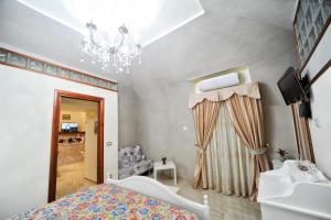 Posteľ alebo postele v izbe v ubytovaní B&B Punto Stella