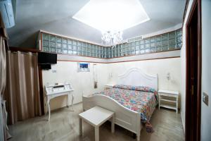 Posteľ alebo postele v izbe v ubytovaní B&B Punto Stella