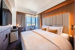 Keio Prelia Hotel Sapporo客房内的一张或多张床位