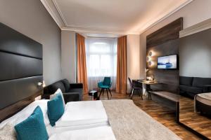 TV a/nebo společenská místnost v ubytování Best Western Hotel Kurfürst Wilhelm I.