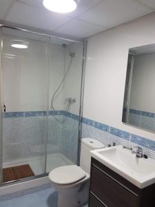 Et badeværelse på Apartamento Centro de Historias