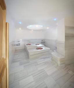 Postel nebo postele na pokoji v ubytování Lalila Blue Suites