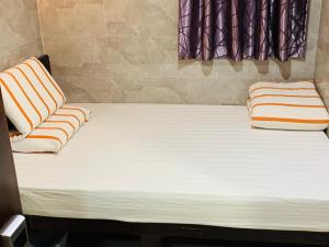 Voodi või voodid majutusasutuse Victoria Inn toas