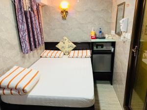 Voodi või voodid majutusasutuse Victoria Inn toas