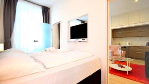 A bed or beds in a room at Vienna Residence, Alsergrund - AKH