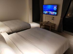 Katil atau katil-katil dalam bilik di 駐駐逢甲 Shine Residence