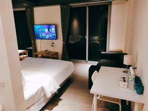 Katil atau katil-katil dalam bilik di 駐駐逢甲 Shine Residence