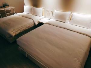 Katil atau katil-katil dalam bilik di 駐駐逢甲 Shine Residence