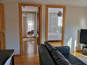 En eller flere senge i et værelse på Apartamento Centro de Historias