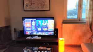TV a/nebo společenská místnost v ubytování Ioannis House Sea View-Perfect family holidays