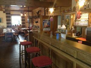 Reštaurácia alebo iné gastronomické zariadenie v ubytovaní Alpengasthaus Sonnhof + 16 fotografií