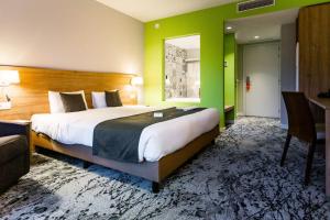 Katil atau katil-katil dalam bilik di Utopia Hotel - Art & Nature Hotel