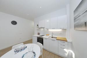 Kuchyňa alebo kuchynka v ubytovaní Idassa bridge apartments