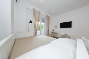 Posteľ alebo postele v izbe v ubytovaní Idassa bridge apartments