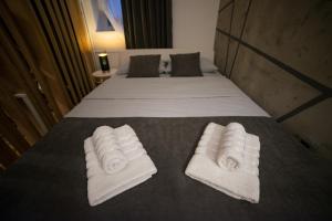 Letto o letti in una camera di Royal Apartment